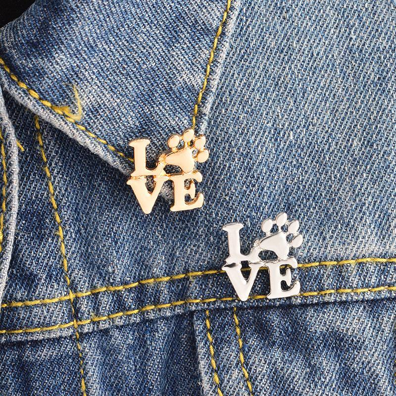 Love Dog claw brooch