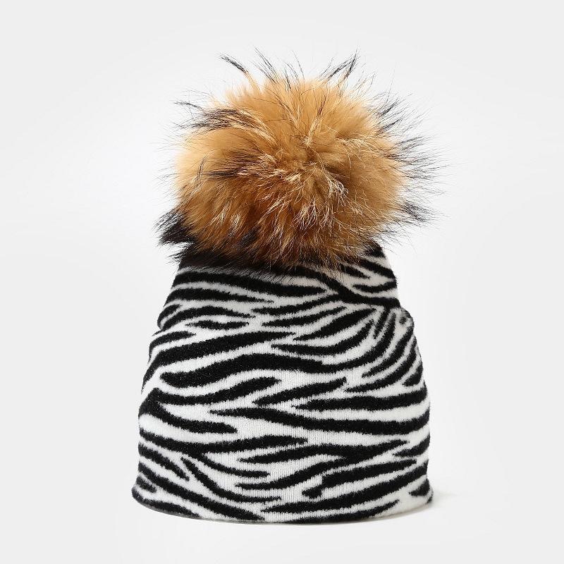 Cow leopard pattern knitted hat women autumn and winter outdoor warmth real hair ball knitted hat tide