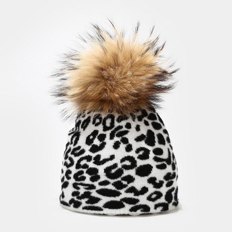 Cow leopard pattern knitted hat women autumn and winter outdoor warmth real hair ball knitted hat tide