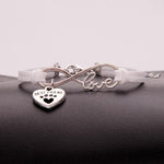 Load image into Gallery viewer, Ladies &quot;infinity best friend&quot; love dog paw pendant bracelet
