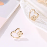 Load image into Gallery viewer, Ladies dog Paw hollow heart Earrings
