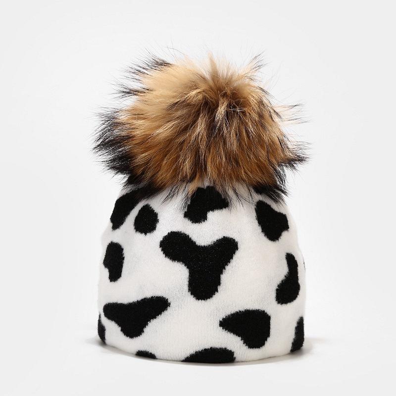 Cow leopard pattern knitted hat women autumn and winter outdoor warmth real hair ball knitted hat tide
