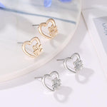 Load image into Gallery viewer, Ladies dog Paw hollow heart Earrings
