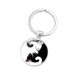 Load image into Gallery viewer, Dog Footprint Glass Pendant Keychain
