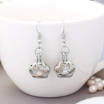 Load image into Gallery viewer, Personalized Hollow Multicolor Luminous Dog Paw Earrings
