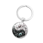 Load image into Gallery viewer, Dog Footprint Glass Pendant Keychain

