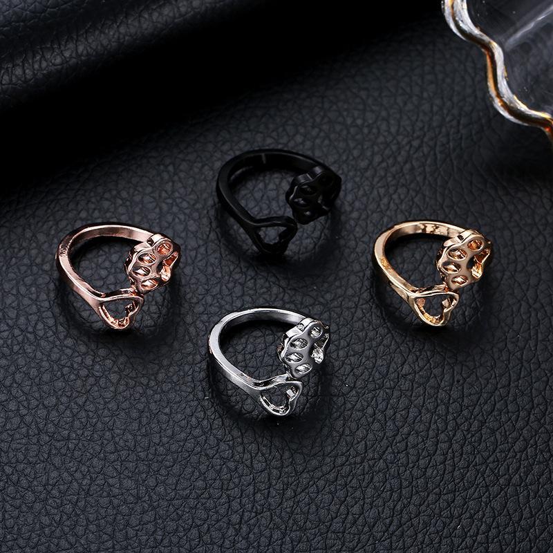 Ladies hollow dog paw opening ring