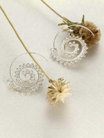 Load image into Gallery viewer, Exotic swirl gear earrings
