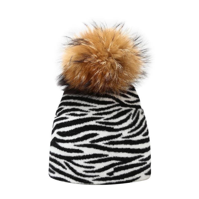 Cow leopard pattern knitted hat women autumn and winter outdoor warmth real hair ball knitted hat tide
