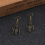 Load image into Gallery viewer, Halloween skull palm earrings
